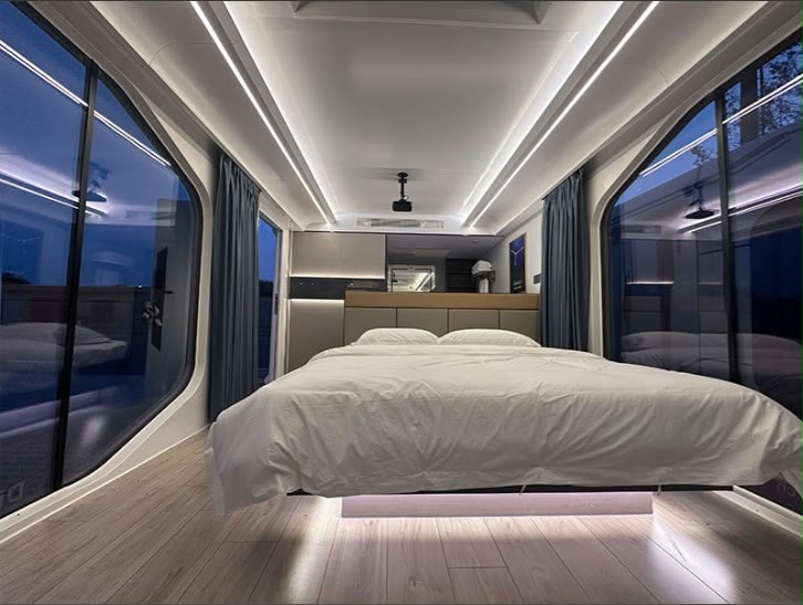 Dormitorio con LED perimetral y vidrio panorámico